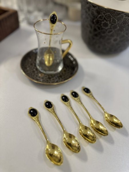 معالق قرفة دهبي خرزة اسود عدد 12