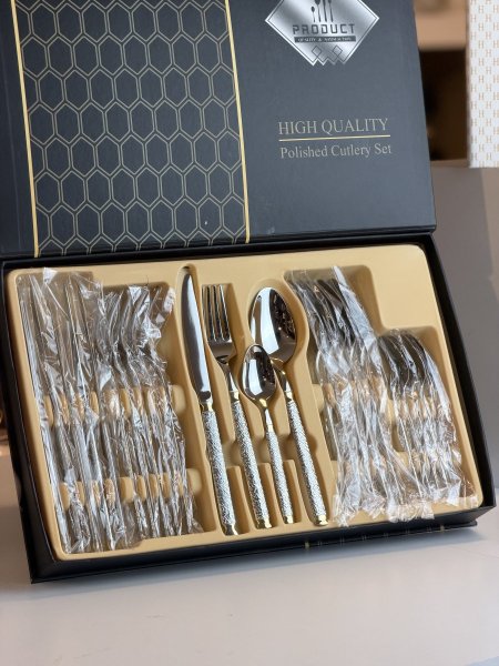 طقم معالق وشوك ٢٤قطعه فضي مع دهبي