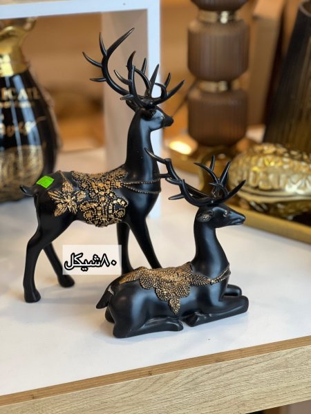 طقم تحف غزالين اسود ودهبي